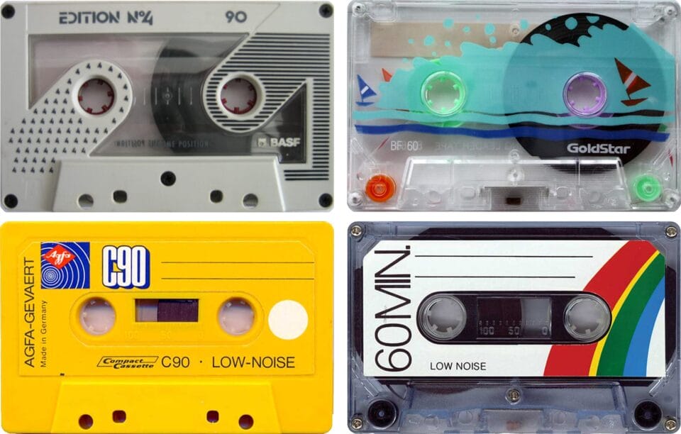 a group of 4 audio cassette tapes in a grid layout