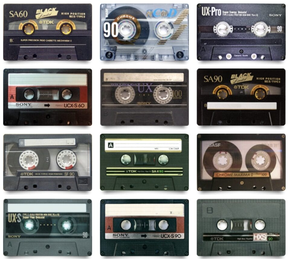 a group of 12 audio cassette tapes in a grid layout