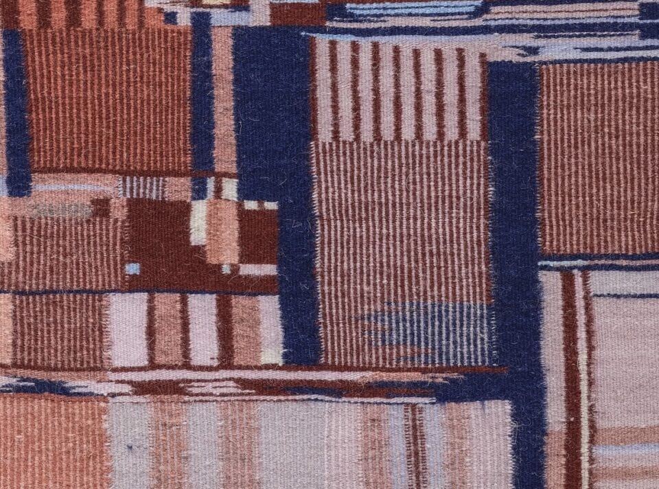 a detail of a Navajo weaving replicating the patterns of a Pentium core processor